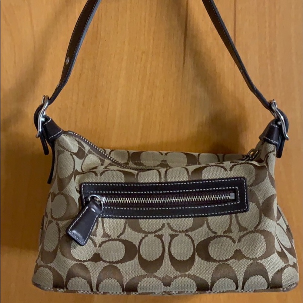 Coach Brown and tan canvas/leather purse